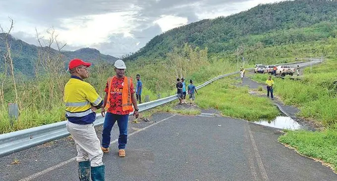 Minister for Infrastructure, Meteorological Services, Lands and Mineral Resources Jone Usamate with his team inspecting the cracks at Lomaloma slip along Savusavu Highway in Vanua Levu on February 6, 2021. Photo: Ministry of Lands and Mineral Resources