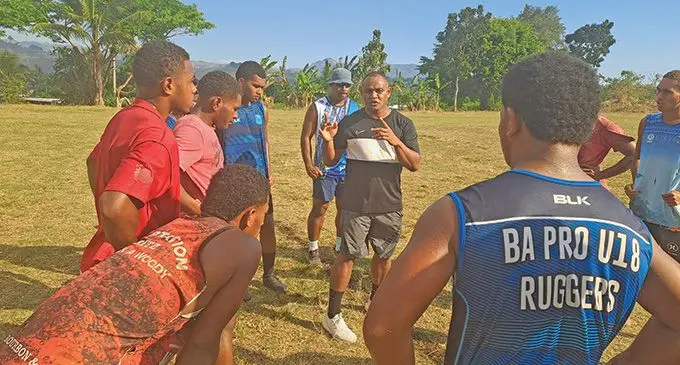 Former Flying Fijians and Harlequins first five-eight Waisea Luveniyali (middle) gives a few points to the Ba Provincial Free Bird Institute Under-18 backline players during training at the school’s ground in Lautoka on September 28, 2022. Photo: Waisea Nasokia