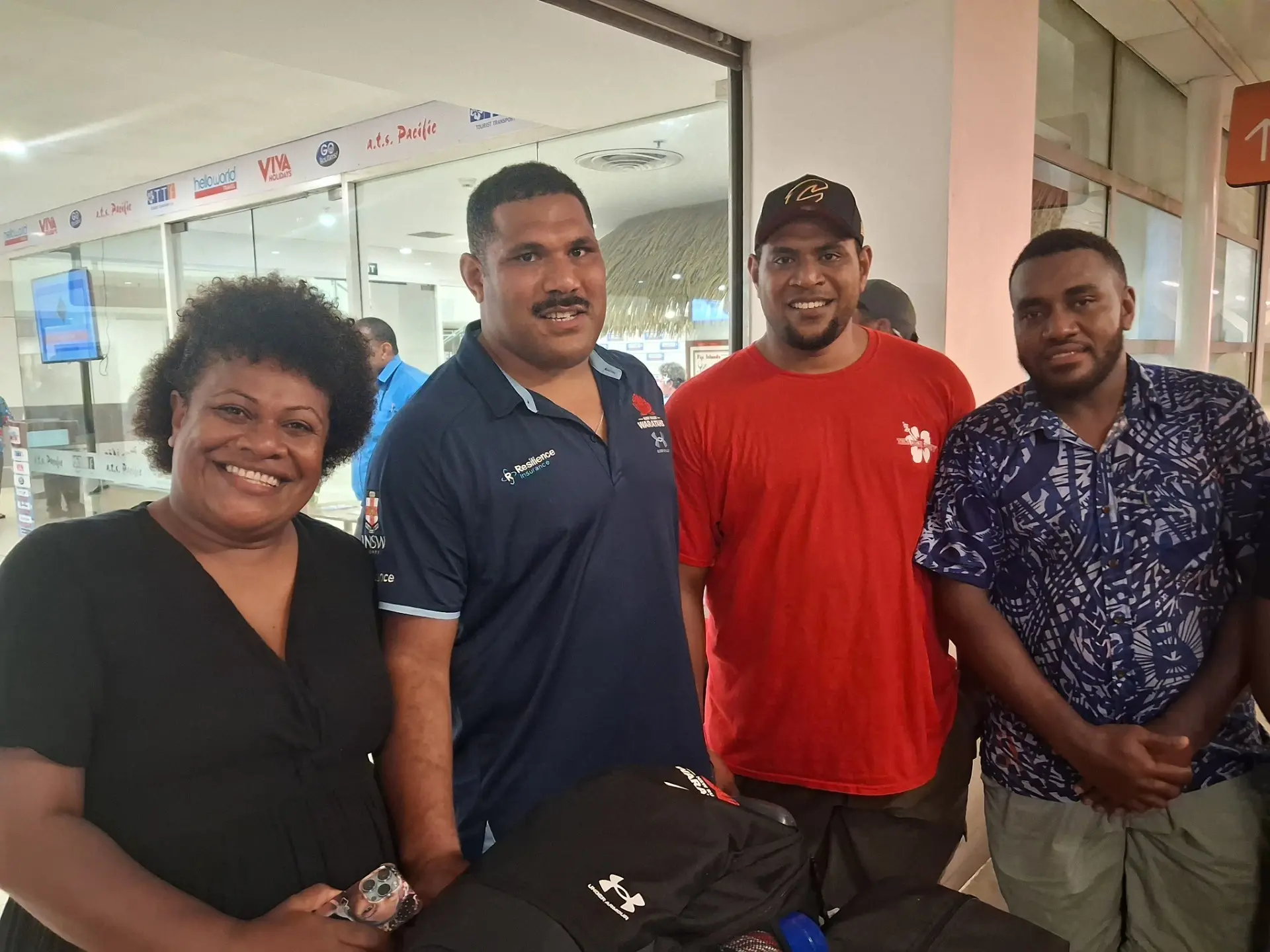 Waratahs’ Apolosi Ranawai with fans at Nadi International Airport on May 14, 2026. Photo: Waisea Nasokia.
