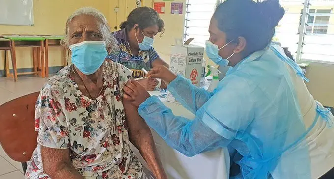 Angamma, 90, getting her first dose of the COVID-19 vaccine at the Natabua High School Hall in Lautoka on June 2, 2021.  Photo: Nicolette Chambers