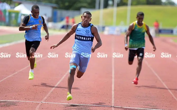 Netani Lolo of Queen Victoria School (middle) won the senior boys 100meters Tailevu Zone heat 2 at HFC Bank Stadium on April 12, 2023. Photo: Ronald Kumar.