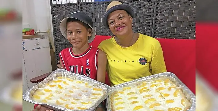 Timaima Lawanuku with her son, Josefa Maiyasawa, selling pies in Labasa on January 23, 2023. Photo: Shratika Naidu