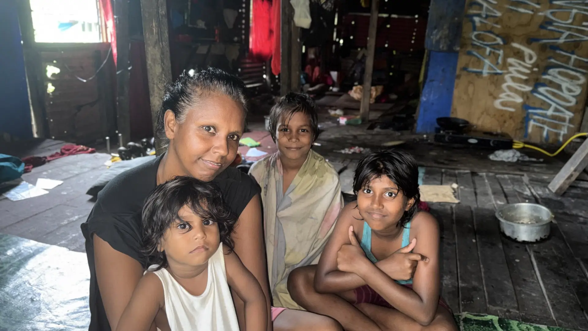  Yogita Hussein and her three daughters at their home in Nabua.