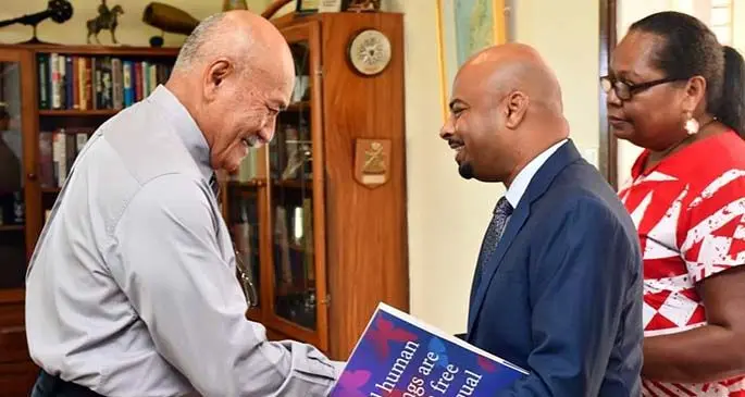 Human Rights and Ant-Discrimination Commission director Ashwin Raj (middle), with President Major General (Ret’d) Jioji Konrote (left).