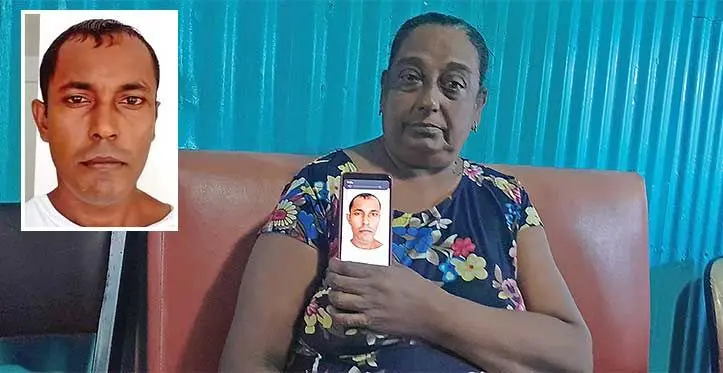 Prem Lata holds a photo of her late son (see inset photo, right). Photo: Wati Talebula-Nuku