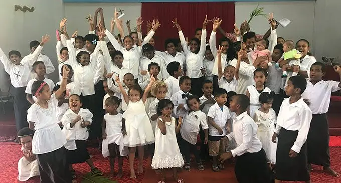 Children-from-the-St-Christophers-Home-celebrating-Palm-Sunday-with-other-kids-from-the-community-at-the-St-Christophers-Anglican-Church-in-Nakasi.