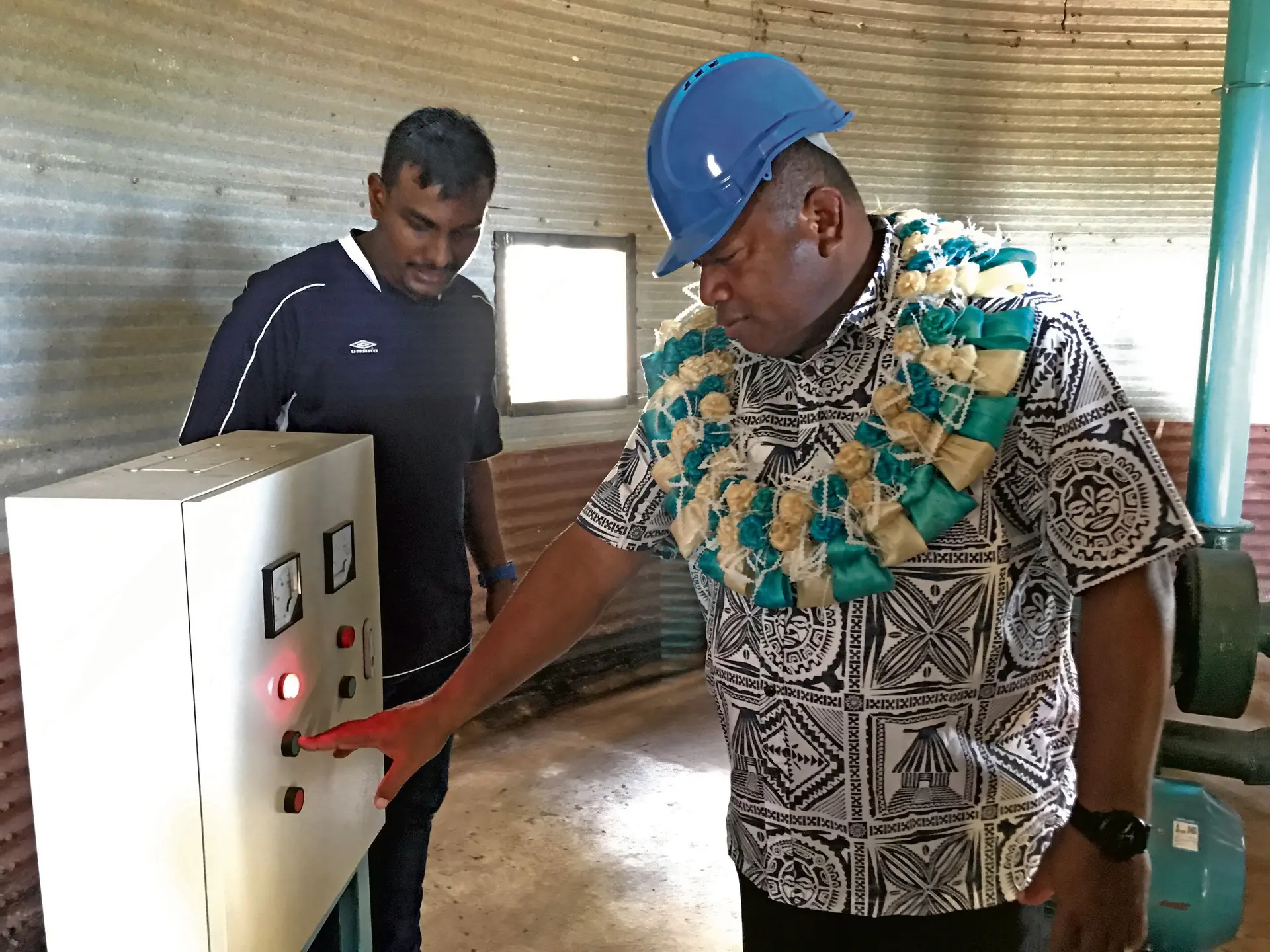 Minister for Agriculture Inia Seruiratu and Fiji Rice Limited mill operations manager Rahil Prasad during the commissioning of the dryers and rice crusher at the mill in Dreketi, Macuata on March 10, 2018. Photo: Shratika Naidu