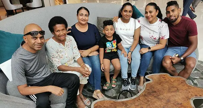Roy Krishna(right) and his wife Naziah Ali(sixth from left) with family members.