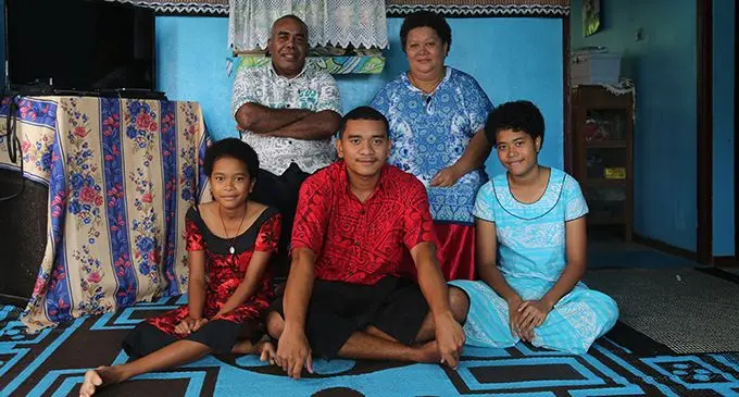 The Tauleka family after worshipping through the televised Sacred Heart Cathedral Mass yesterday. Photo: Inoke Rabonu