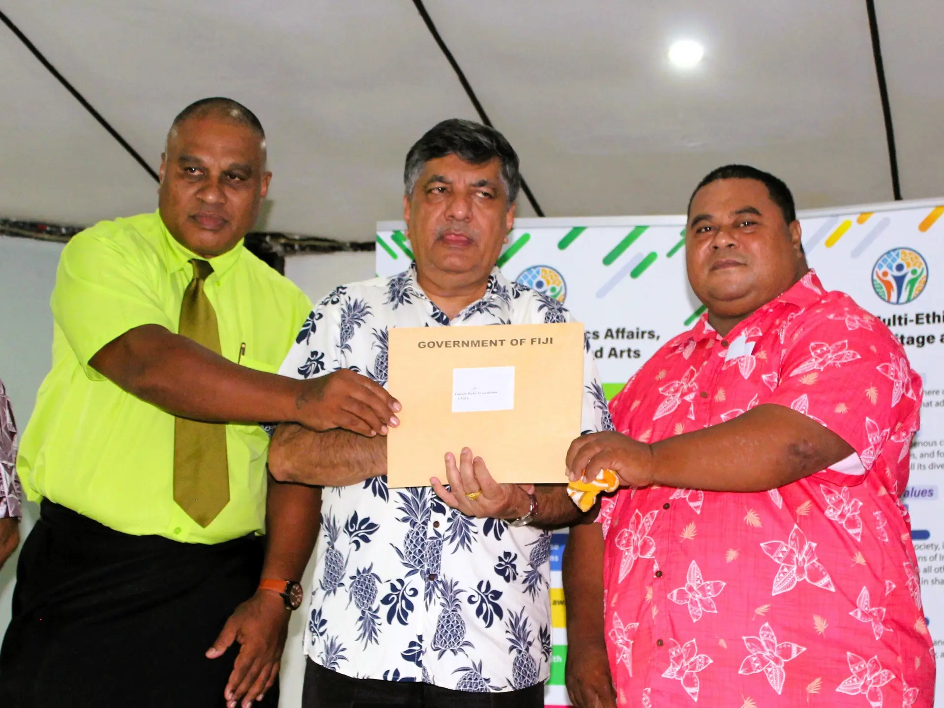 Tabiang Methodist Church and community leader, Tekata Toaisi (left), with a church member being awarded their multi-ethnic grant from Minister Charan Jeath Singh, in Labasa on March 24, 2026.