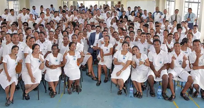 Minister for Economy Aiyaz Sayed-Khaiyum (middle) with Natabua High School teachers and Year 13 students.