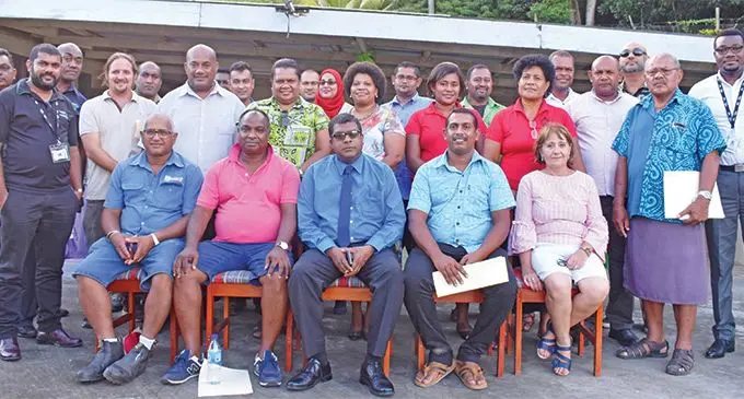 Minister for Agriculture, Rural and Maritime Development, Waterways and Environment Mahendra Reddy (sitting, centre) with Agro-exporters at the Nacocolevu Research Station in Sigatoka on Monday on March 18,