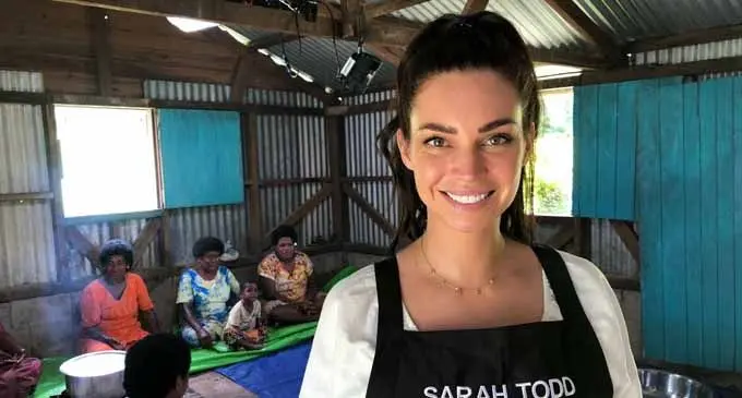 Sarah Todd working with members of local communities .
