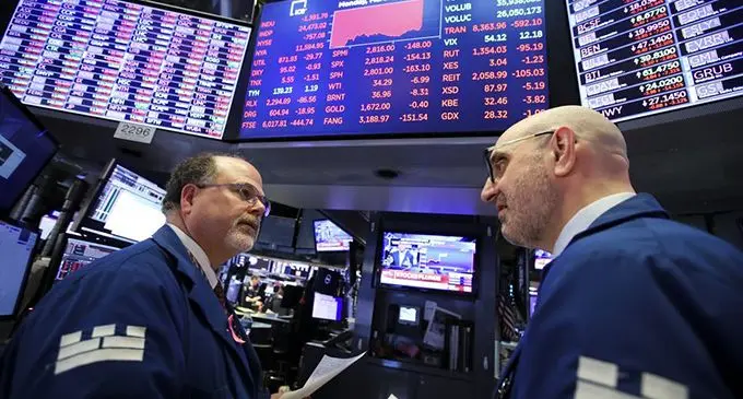 Traders work at New York Stock Exchange (NYSE) in New York, the United States, on March 9, 2020. (Xinhua/Wang Ying) 
