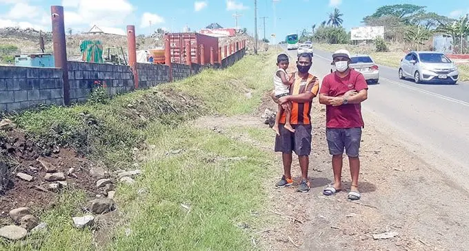 From left: Fastfood eatery owner Darmendra Kumar with Carwash owner Duna Kumar stands where the Minivan had previously been during the accident on October 3, 2021 in Saweni, Lautoka. Photo: Salote Qalubau
