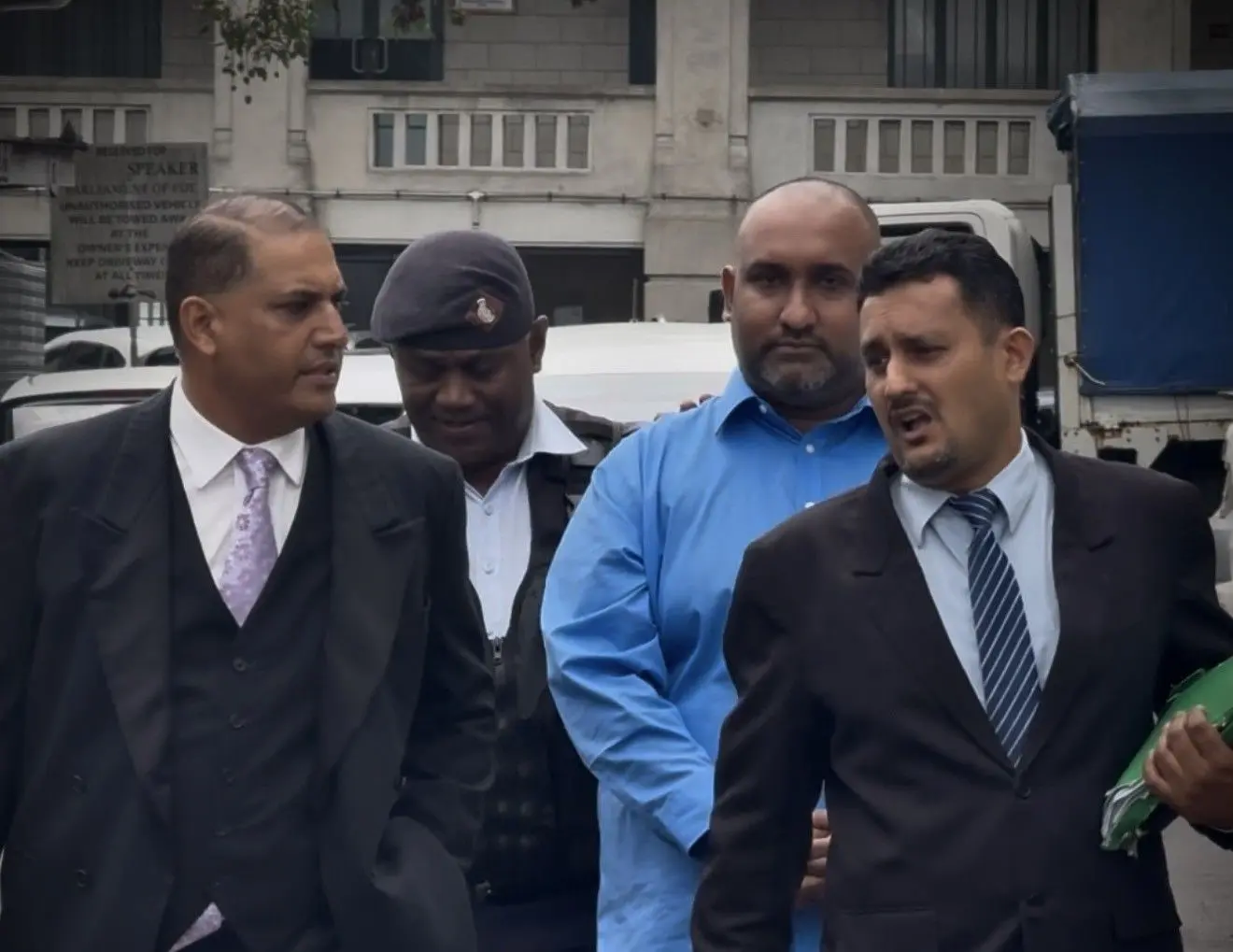 Accused Shonal Shiv Nand (in blue shirt) outside the Suva Courthouse on November 4, 2025.