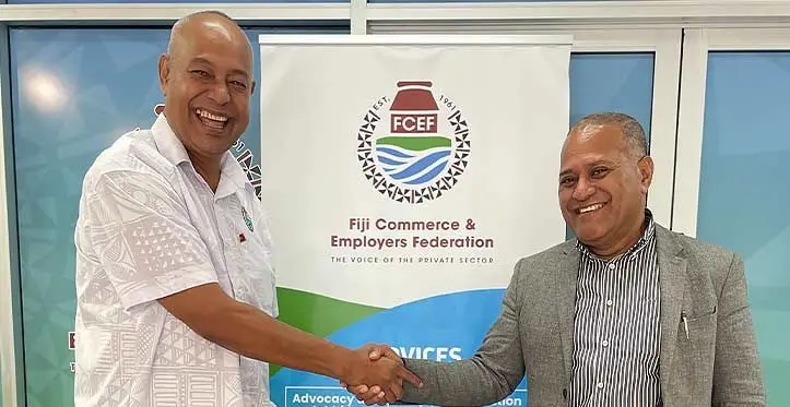 From left: Outgoing FCEF CEO, Kameli Batiwei shakes hands with the newly appointed CEO, Jonetani Tonawai on July 19, 2023. Photo: Maraia Vula