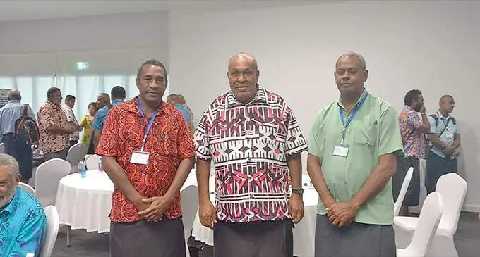 The chairman of the Nakovacake Development Trust, Anare Naivurevure, (left), Minister for iTaukei Affairs Iferemi Vasu and Narewa Village headman Samuela Tuidraki in an earlier land consultation event. Photo: Mereleki Nai