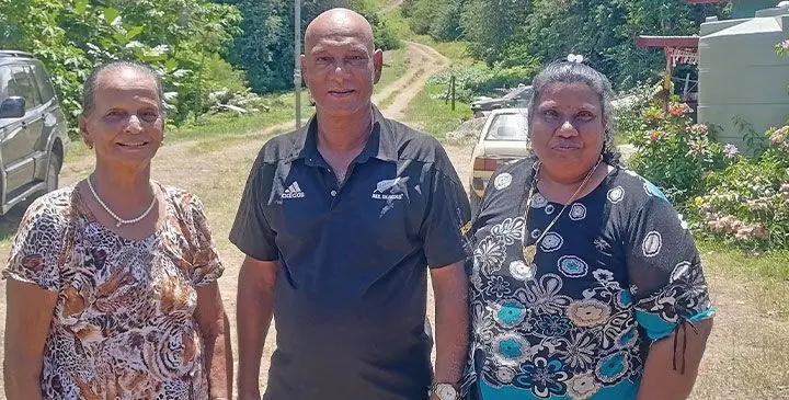 Ram Kumar and his family at their home in Nawaicoba.