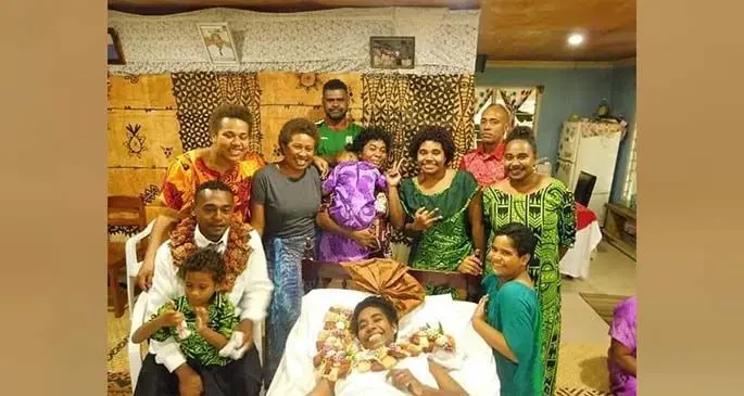 The newly-wedded couple with family members at their home in Nasekula on May 22, 2020.