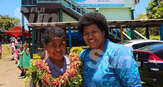 Suva Primary School Head Boy, Ratu Wame Koroi with mum, Setaita Koroi after the prefects induction. Photo: Kelera Sovasiga