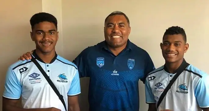 From left: Kevueli Saulvakacolo,former Fiji rugby league captain Petero Civoniceva with Silivenusi Toka. Photo: Facebook/Adopt a Sharkie
