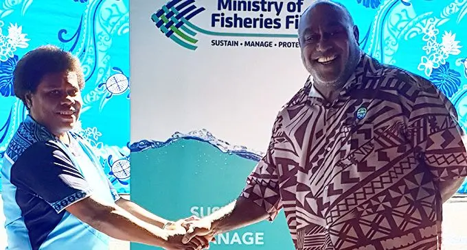 Laisiana Nayasi (left) with Minister for Fisheries Semi Koroilavesau.   Photo: Nicolette Chambers
