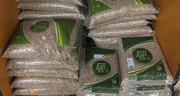 Pre-packed bags of Fiji Rice.