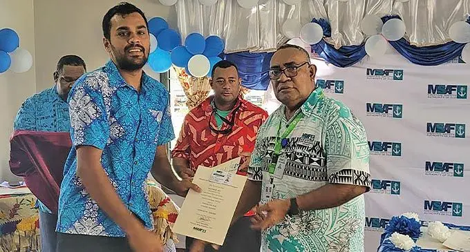 Sarferoz Ali (left), receives his captain’s licence from Maritime Safety Authority of Fiji (MSAF) Manager Ships Inspection Officer in Charge, Sesoni Komaisoso in Nadi on November 2, 2022.