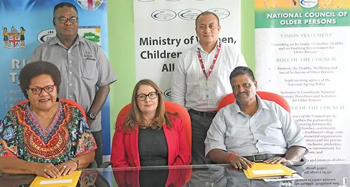 Sitting from left: Fiji National University’s Dean for the College of Humanities and Education Eci Nabalarua, Permanent Sec- retary for Women, Children and Poverty Alleviation Jennifer Poole, Then India Sanmarga Ikya (TISI) Sangam president Sadasivan Naicker after the signing in Suva on April 16, 2019.