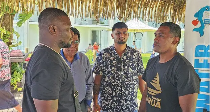 Joseph Kwadjo, (left), faces Robin Hazelman (right) while promoter Samir Khan looks on during the Bluewater Boxing Promotion launch at the Holiday Inn, Suva, on December 12, 2024.