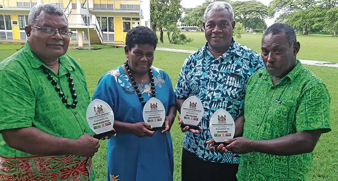 From left: Farasiko Tovolea, Elenoa Nainima, Atekini Duaibe and Luke Nausuludriu with their recognition awards during the Ministry of Education, Heritage and Arts awards ceremony dedicated to the retiring teachers in the Western Division on December 31, 2020.  Photo: Nicolette Chambers