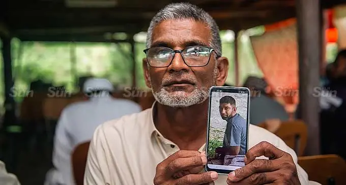 Father of the latest fatality, Mohammed Ishaq mourns the death of his son, Aiyaz Khan (insert) who died in an accident along the Queens highway near Warwick Fiji resort along the Coral Coast on January 7, 2023. Photo: Leon Lord