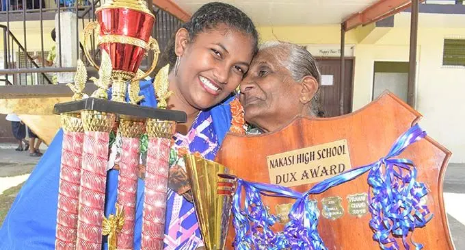 Nakasi High School 2022 annual awards day DUX award winner, Meeshal Ayushna with grandmother Kannimal on November 25, 2022. Photo: Ronald Kumar.