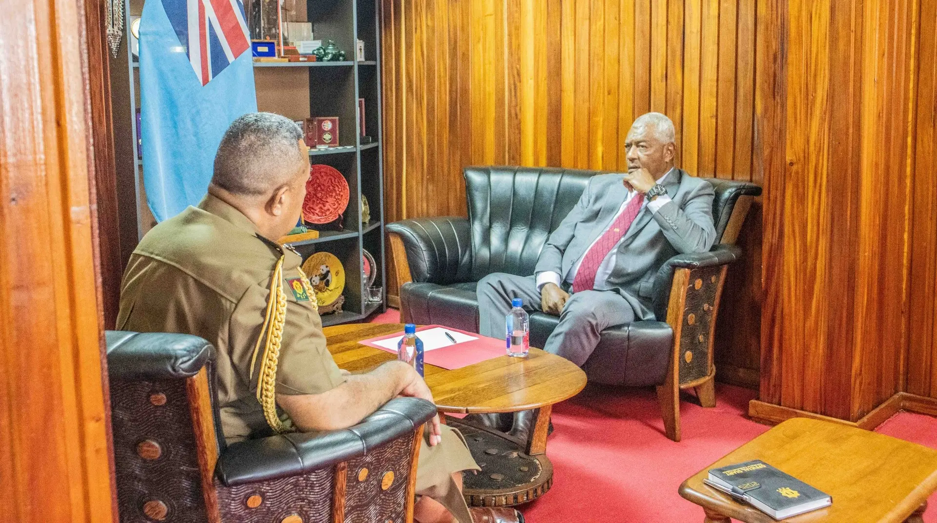 Minister for Defence and Veteran Affairs Pio Tikoduadua chats with Commander RFMF Major-General Ro Jone Kalouniwai.