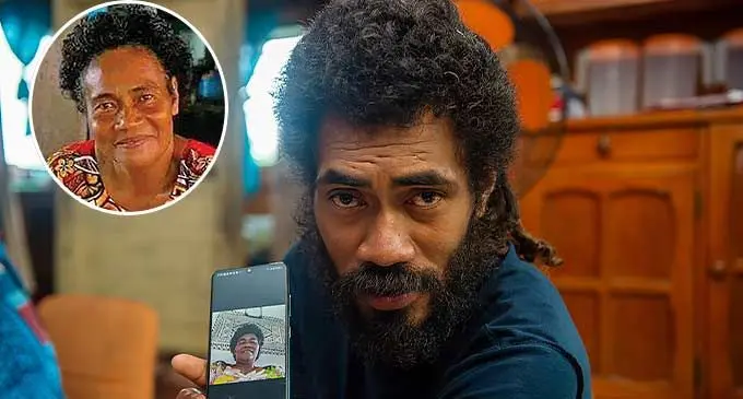In mourning .... Viliame Maukakala, with a photo of his mother(insert) Vela Maukakala.Photo: Leon Lord