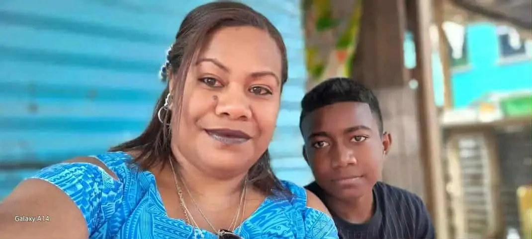 Sulueti Saweya Kata with her son, 15-year-old Joseph Michael Kata, who died in a boating incident.