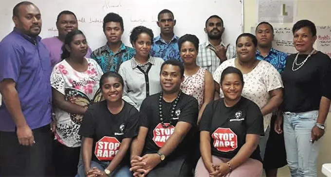 Participants and facilitators of the Sexual Reproductive Health and Rights Training workshop in the Western Division.