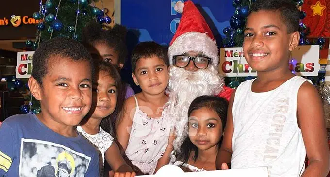 Many of children who visited the TappooCity complex in Suva had an opportunity to have a photo taken with Santa Claus. Photo: Ronald Kumar