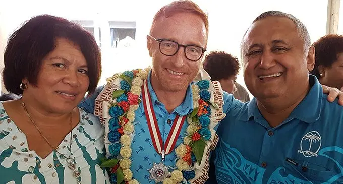Former Fijian 7s head coach Ben Ryan (middle) with FRU chairman Francis Kean right during the 2016 Olympic Games gold medal win celebration in Suva.  Photo: FRU Media