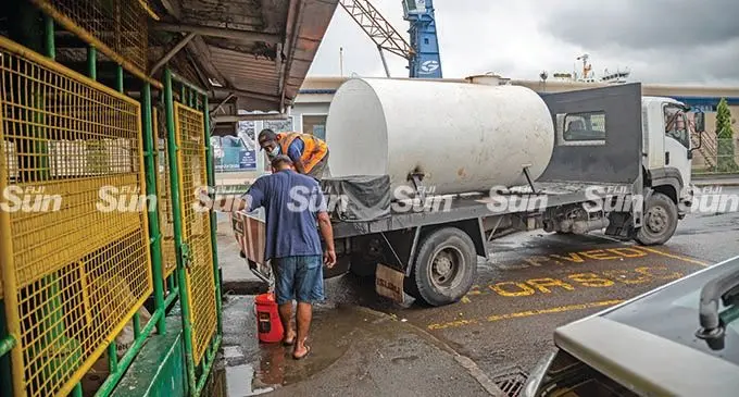 A Water Authority of Fiji truck carting water to stall owners at the Suva Market. Photo: Leon Lord