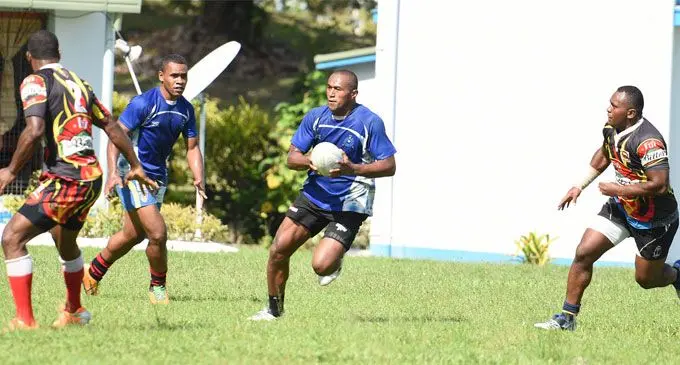 Police 7s player Manueli  Laqai (with ball), looks for support during a training session with National Fire Authority at Nasova ground in Suva. Photo: Ronald Kumar
