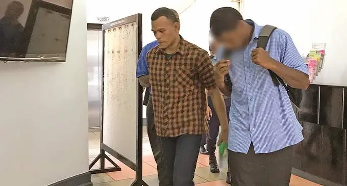 Samuela Bokadi (in brown shirt) outside the High Court in Suva. Photo: Ashna Kumar