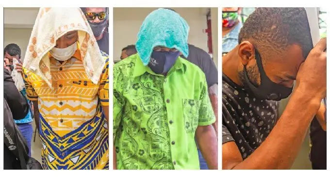 Murder accused’s Semiti Vakatuakai, 28, Emori Naqova, 45, and Vilikesa Delana, 25, at the Magistrates Court in Nausori on January 31, 2022. Photos: Leon Lord