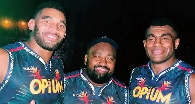 Swire Shipping Fijian Drua Captain Meli Derenalagi and Nemani Nagusa after OPIUM Bar handed over some merchandise on Saturday night. Photo: Opium Bar.