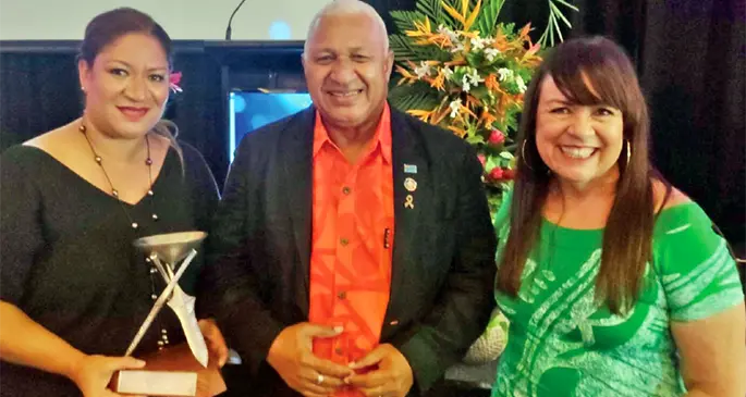 From left: Rosie Holidays Fiji Director Business Development Adeline Lee-Erasito, Prime Minister, Voreqe Bainimarama and Rosie Holidays Fiji creative director Brigid Lomaloma-Whitton.