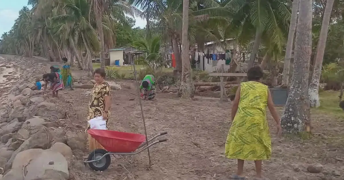 Women of Marou help clear rocks and debris along the rehabilitation site, when the coastal protection works began early this year. Photos supplied. 