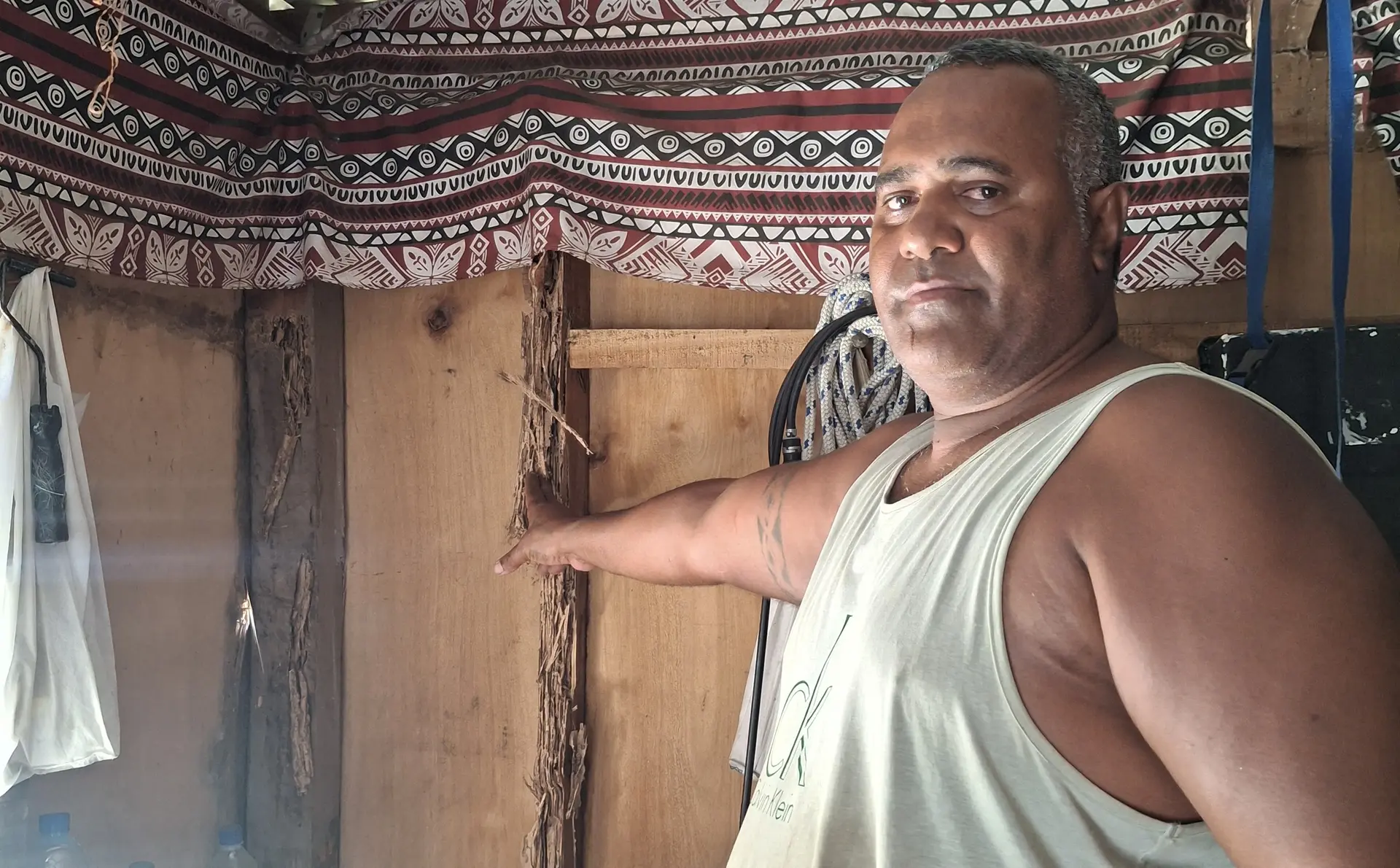 Ratu Sione Ravusoni, 47, lives with his wife, eldest son, daughter-in-law, grandchild and three school-aged children in a makeshift shed.