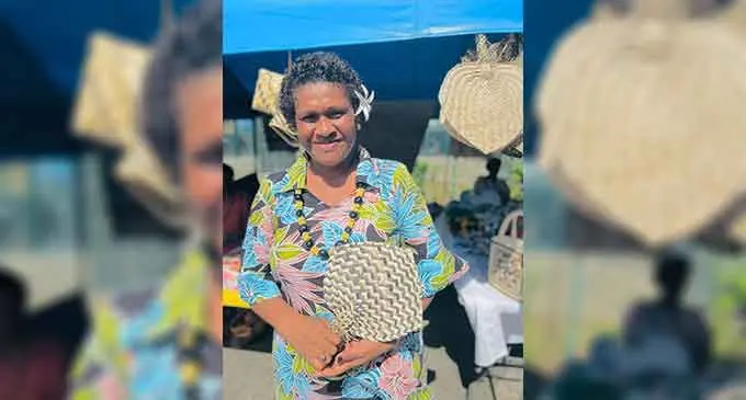 Milika Rokomada holding her famous Iri ni Daku (Fan). Photo: Nolishma Narayan