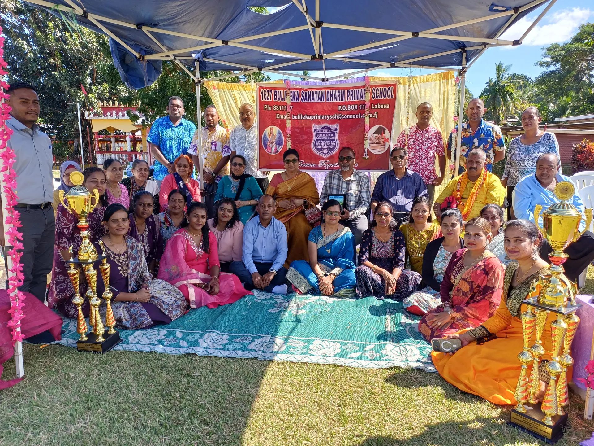 Dharmen Chandra with his wife, Madhu Chandra (sat in the middle) invited guests and teachers during the handing over of dux trophies at Bulileka Sanatan Dharm Primary School in Labasa on July 10, 2026. Photo: Shratika Naidu